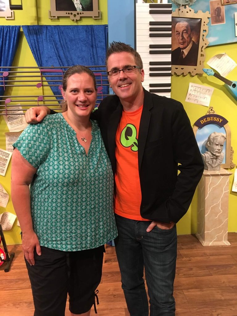 A smiling Barbara Hartman poses with Quaver’s Graham Hepburn during a visit to the company’s Nashville headquarters.