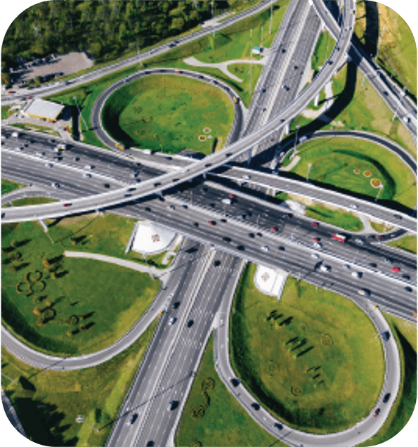 ThemeBlocks_grid_noText_Transportation – QuaverEd A picture from the sky of a busy intersection representing the theme Transportation from Quaver Pre-K