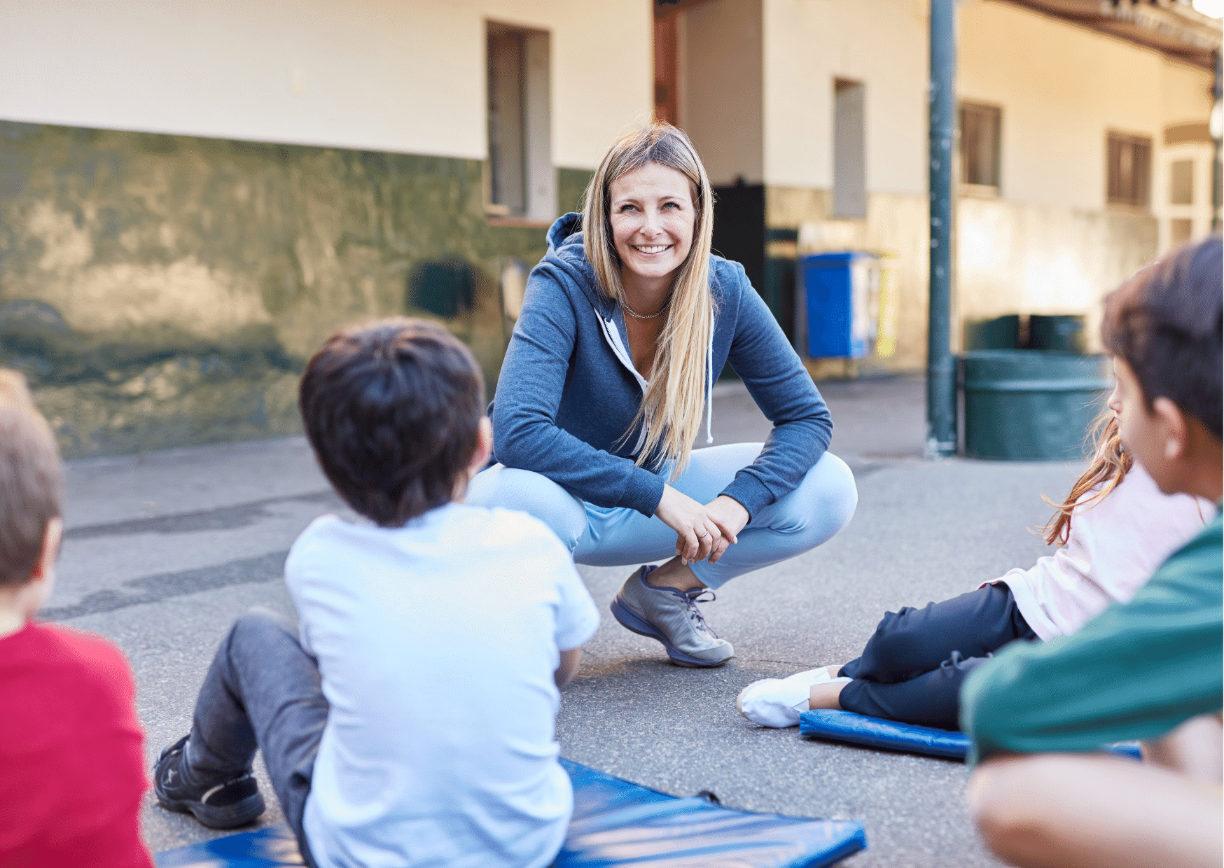 Woman pictured instructing a P.E. class.