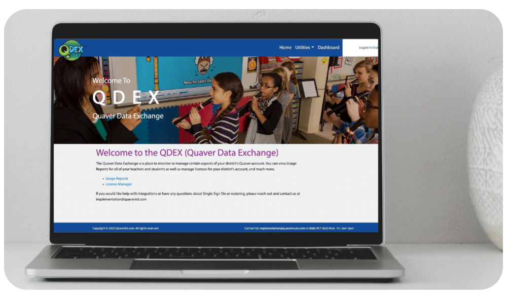 Website-Rounded-Corner-10 – QuaverEd Laptop with Quaver Data Exchange screen