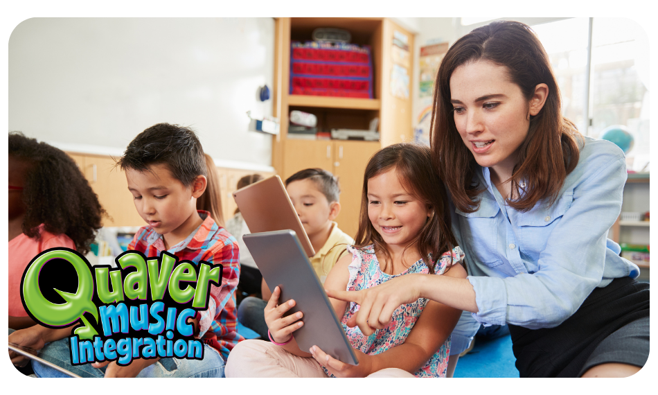 Female teacher helps female student on a tablet.