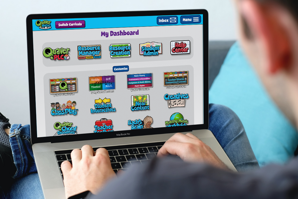 A teacher uses the Quaver Music's Teacher Dashboard to access supplemental resources.